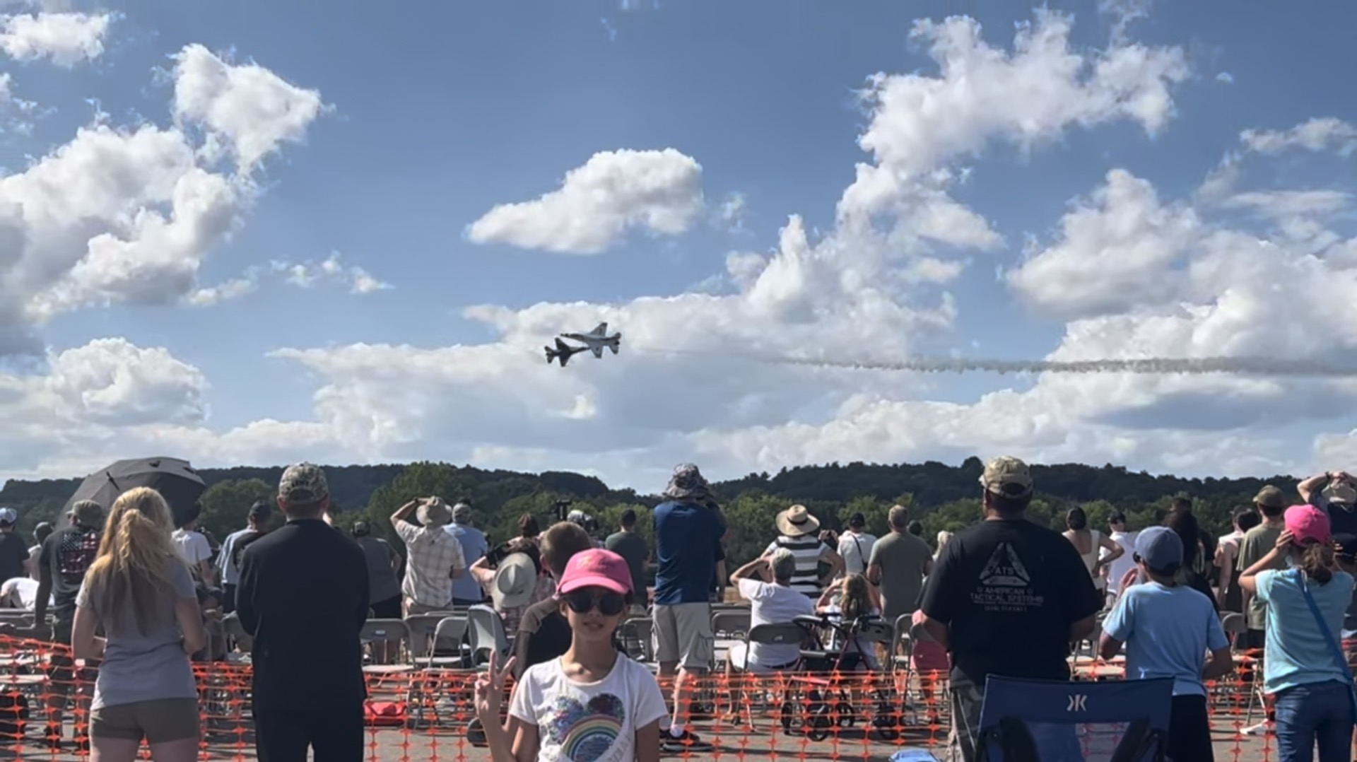 Visitors exploring aircraft during an aviation expo / 观众在航空博览会上参观飞机