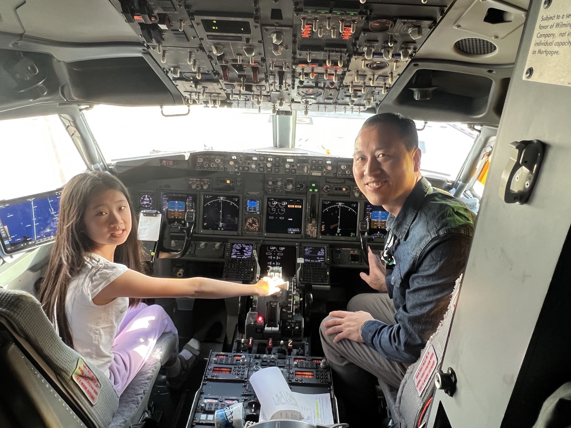 Young family member experiencing the joy of aviation